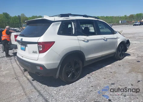 2019 Honda Passport Elite z USA, uszkodzony, nr VIN 5FNYF8H09KB015198
